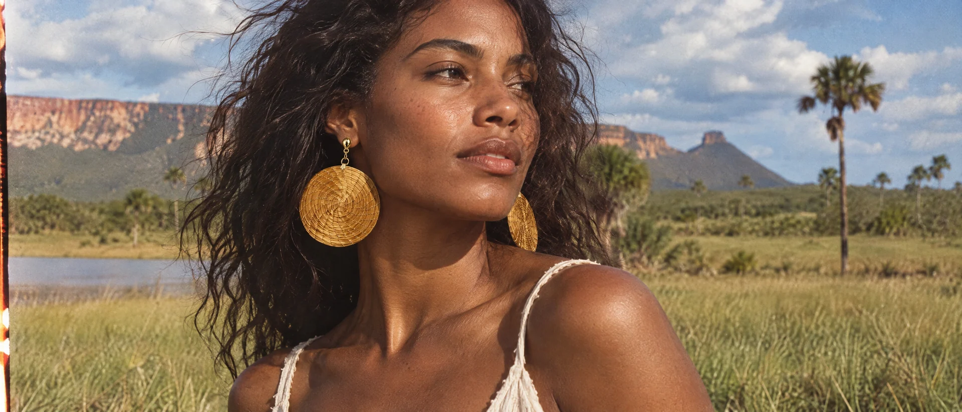 Close-up editorial view of round woven earrings